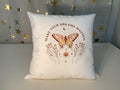 Pillow printed with “Make Your Dreams Happen”